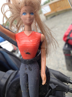 A dirty and wind-blown Barbie