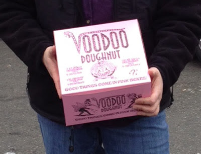 Image of Judy holding a pink Voodoo box